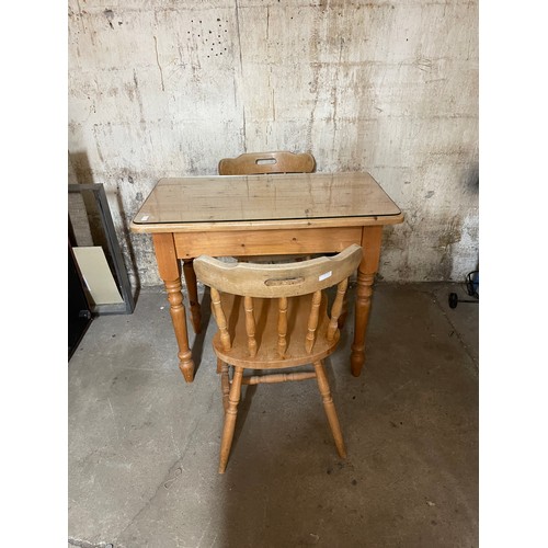 313 - Vintage pine glass top table and two chairs overall height 30 inches, 36 wide