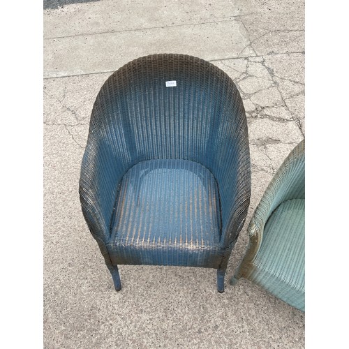 338 - Pair of lyold loom wicker chairs