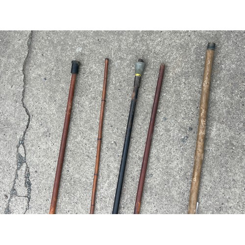 162 - Selection of walking sticks one silver topped