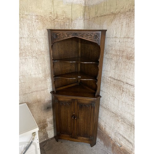 334 - Oak linen corner cabinet measures approx 67 tall, 18 by 18