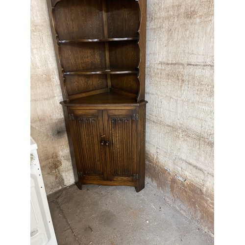 334 - Oak linen corner cabinet measures approx 67 tall, 18 by 18