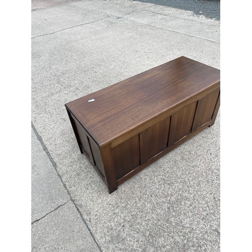 312 - Mahogany four panelled blanket/toy box measures approx 19 inches tall by 42 wide and 18 deep