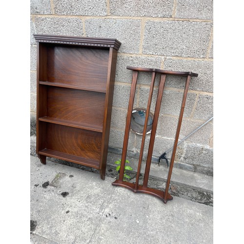 294 - Two wall hanging book cases/plate rack largest measures approx 46 inches tall, 27 wide