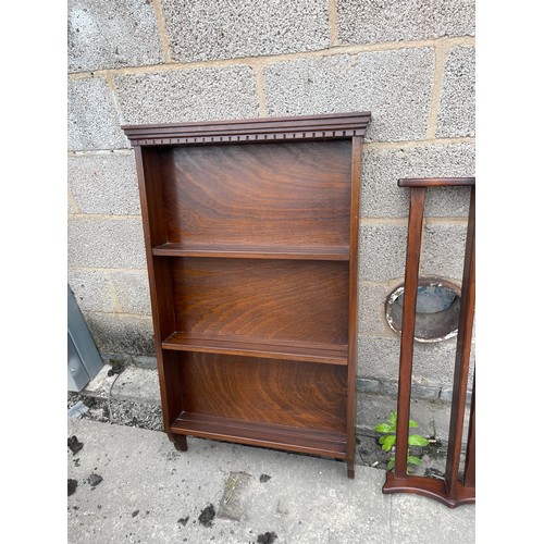 294 - Two wall hanging book cases/plate rack largest measures approx 46 inches tall, 27 wide