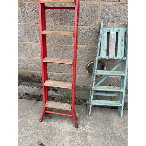 100L - Two pair of step ladders one wooden one metal tallest measures 76 inches tall