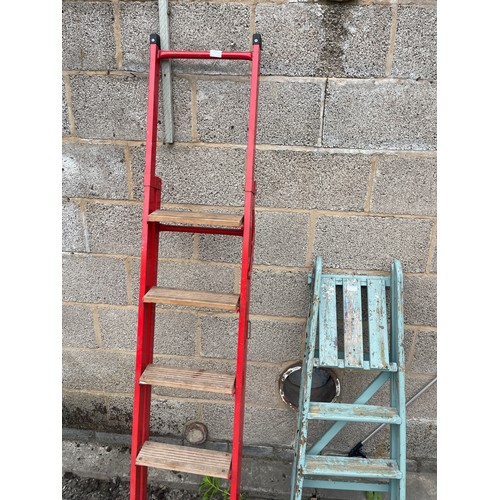 100L - Two pair of step ladders one wooden one metal tallest measures 76 inches tall