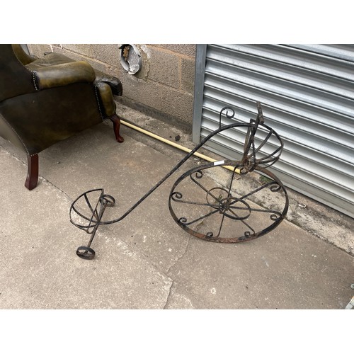 100K - Metal outdoor penny farthing planter measures approx 29 inches tall by 36 long