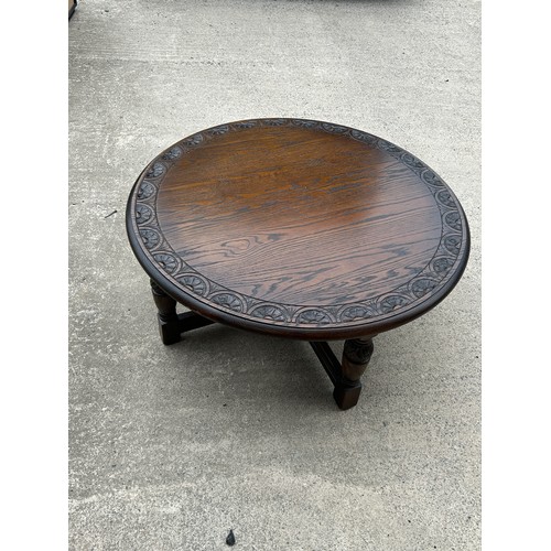 320 - Oak oversized carved top coffee table measures approx 18 inches tall, 40 diameter