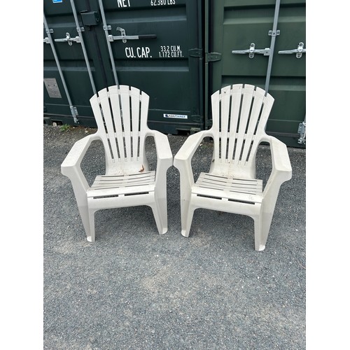 100D - Two plastic garden chairs