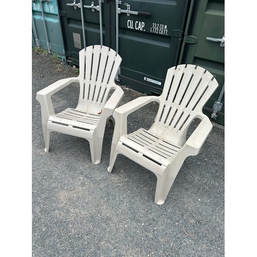 100D - Two plastic garden chairs