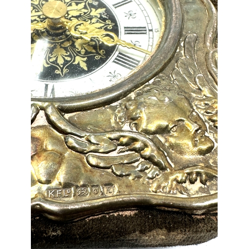 7 - Small silver picture frame measures approx 9.2cm by 6.5cm  & silver cupid front clock measures appro... 