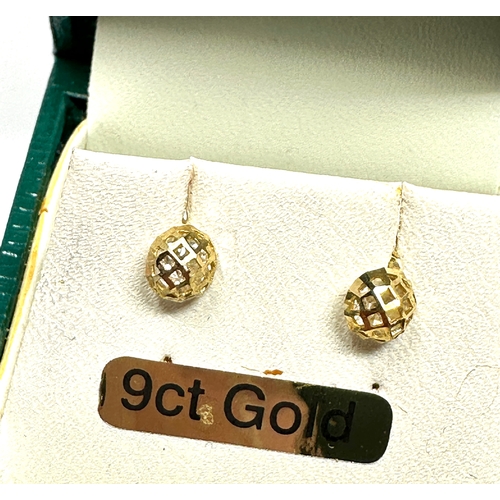 69 - Boxed 9ct gold white stone earrings