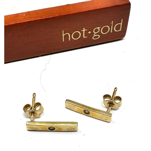 71 - boxed 9ct gold hot .diamond earrings