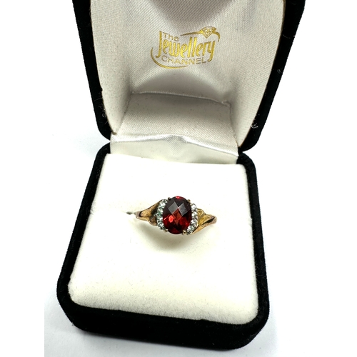 74 - Boxed 9ct gold red garnet & white sapphire ring with c.o.a  weight 2.6g