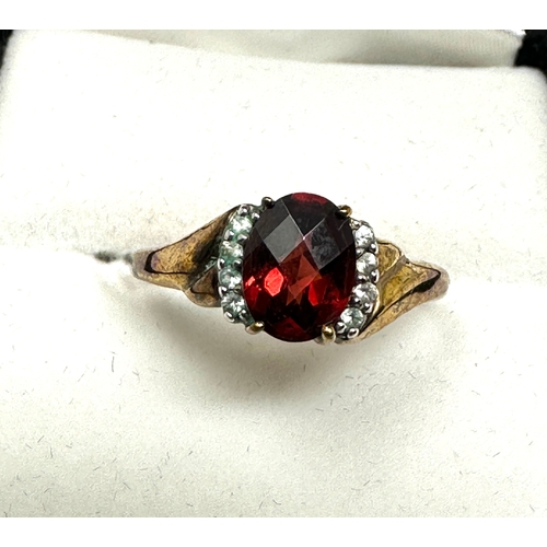 74 - Boxed 9ct gold red garnet & white sapphire ring with c.o.a  weight 2.6g