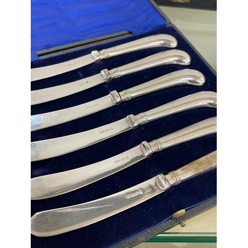 387 - 3 cased sets of silver handled butter knives