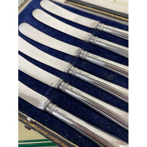 387 - 3 cased sets of silver handled butter knives