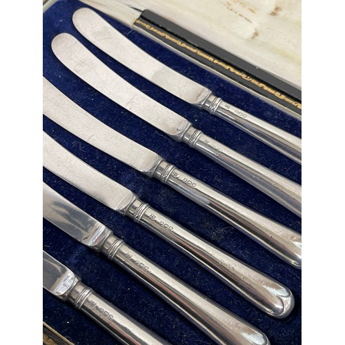 387 - 3 cased sets of silver handled butter knives