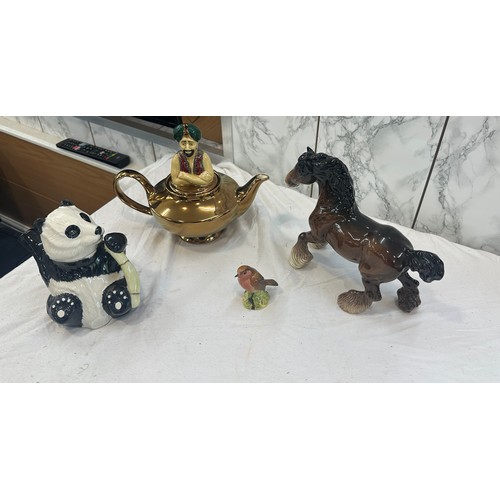 95 - Selection of beswick items to include tea pot, horse, bird and a wade tea pot