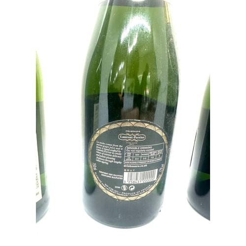 89 - Three bottles of sealed Champagne to include Pol Acker Brut, Lanson and Laurent-Perrier