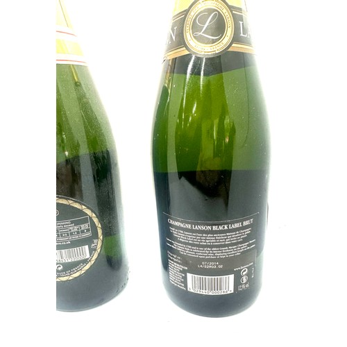 89 - Three bottles of sealed Champagne to include Pol Acker Brut, Lanson and Laurent-Perrier