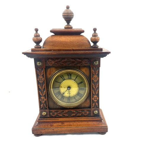 54 - Antique mahogany wind up mantel clock measures approx 14 inches tall by 8 wide, untested