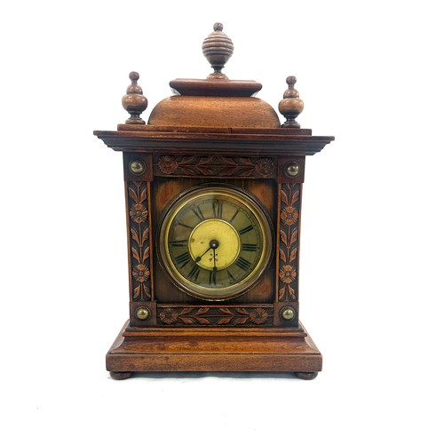 54 - Antique mahogany wind up mantel clock measures approx 14 inches tall by 8 wide, untested