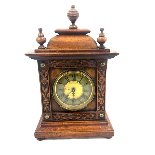 54 - Antique mahogany wind up mantel clock measures approx 14 inches tall by 8 wide, untested