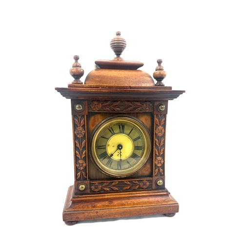 54 - Antique mahogany wind up mantel clock measures approx 14 inches tall by 8 wide, untested