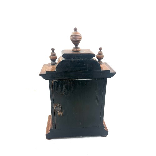 54 - Antique mahogany wind up mantel clock measures approx 14 inches tall by 8 wide, untested