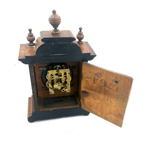 54 - Antique mahogany wind up mantel clock measures approx 14 inches tall by 8 wide, untested