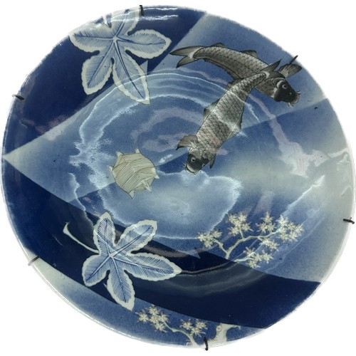 547 - Antique oriental large charger with fish scenes approx diameter 15 inches