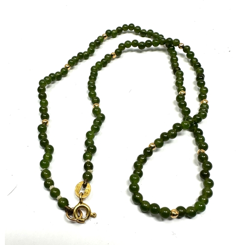 88 - 9ct gold jade & gold bead necklace measures approx 15ins long weight approx 6g