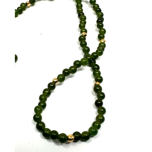 88 - 9ct gold jade & gold bead necklace measures approx 15ins long weight approx 6g