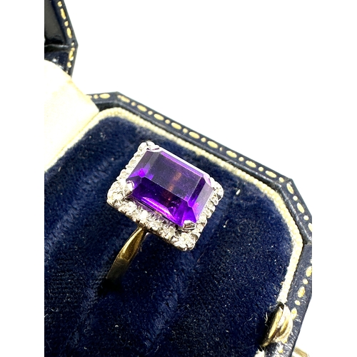 90 - 18ct gold amethyst & diamond halo ring weight 3.6g