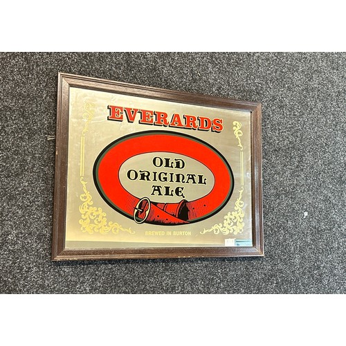 58 - Vintage Everards advertising mirror measures approx 19 inches tall by 24 wide