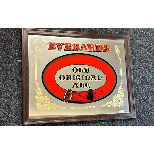 58 - Vintage Everards advertising mirror measures approx 19 inches tall by 24 wide