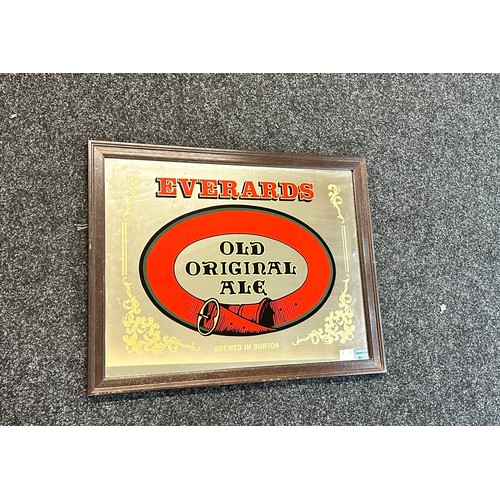 58 - Vintage Everards advertising mirror measures approx 19 inches tall by 24 wide