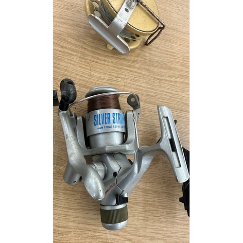 73 - Four vintage fishing reels to include Okuma, Silver striker etc