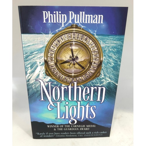 83 - Signed Phillip Pullman Northern lights book
Donated to Dogs Trusts shop in Bingham – all proceeds go... 