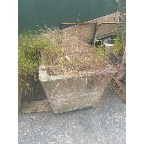 101E - Large over sized concrete garden trough measures approx 22 inches tall by 53 wide and 27 deep