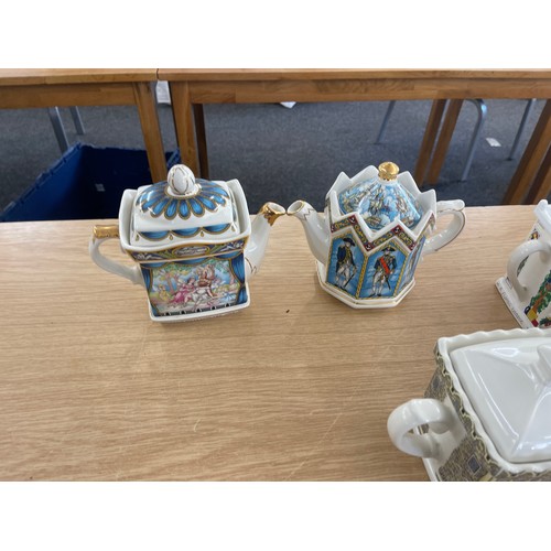 61 - Selection of assorted tea pots includes Sadler etc