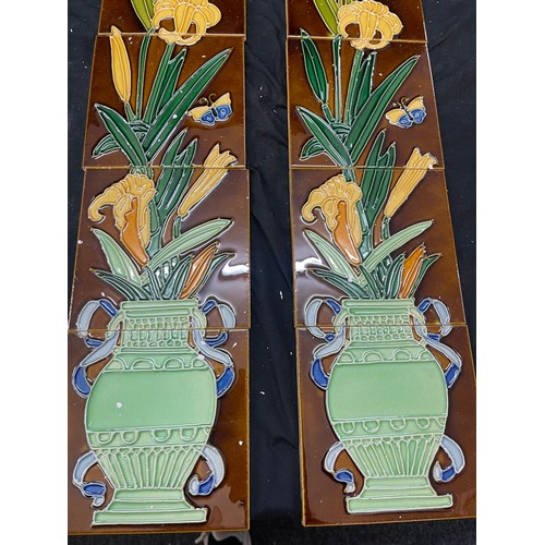 33 - Set of glazed fire place tiles 10 in total each measures approximately 6 inches by 6 inches