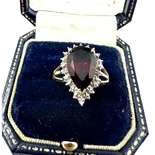 102 - 9ct gold garnet & diamond ring weight 3.4g