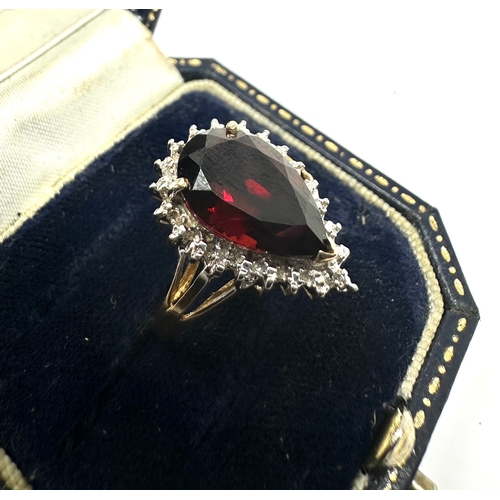 102 - 9ct gold garnet & diamond ring weight 3.4g