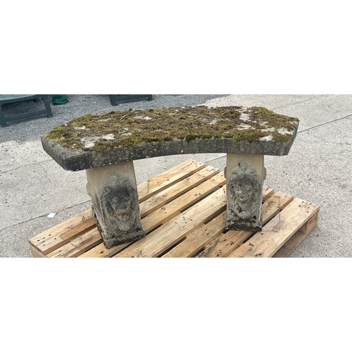 100N - Concrete garden bench with lion heads measures approx 21 inches tall by 48 wide and 19 deep