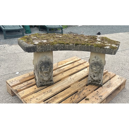 100N - Concrete garden bench with lion heads measures approx 21 inches tall by 48 wide and 19 deep