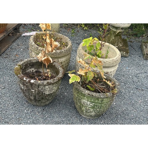 100T - Four concrete garden planters largest measures approx 13 inches tall x 13 diameter