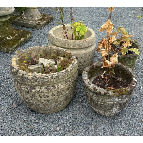 100T - Four concrete garden planters largest measures approx 13 inches tall x 13 diameter