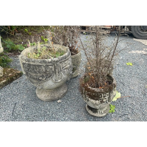 100U - Four concrete garden planters largest measures approx 15 inches tall by 15 diameter